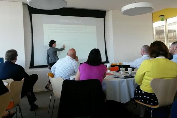 woman presenting on validation