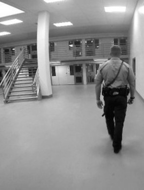 guard walking around jail