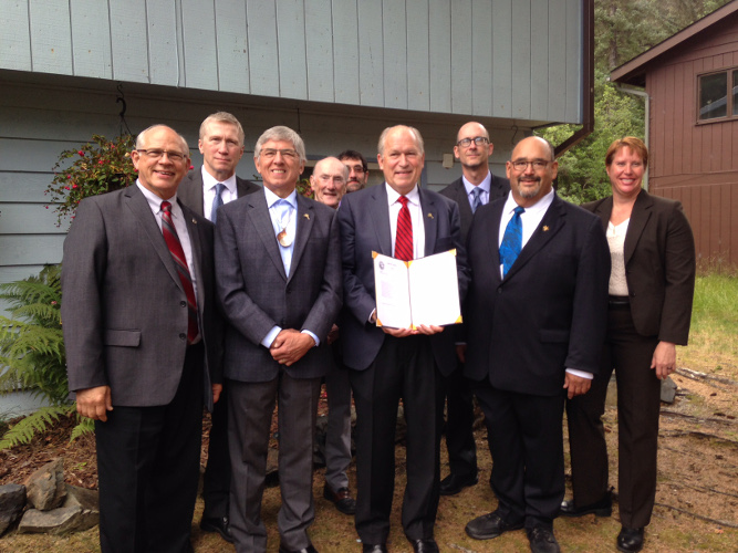 group signing legislation in alaska