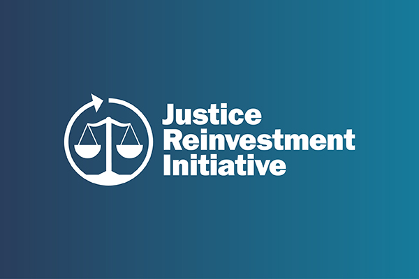 Justice Reinvestment Initiative Logo against a blue gradient background