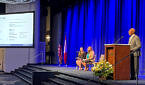 Presentation speakers on stage