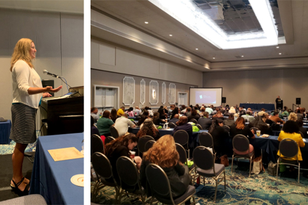 Person speaking at a podium. Back view of an room full of people watching a presentation.