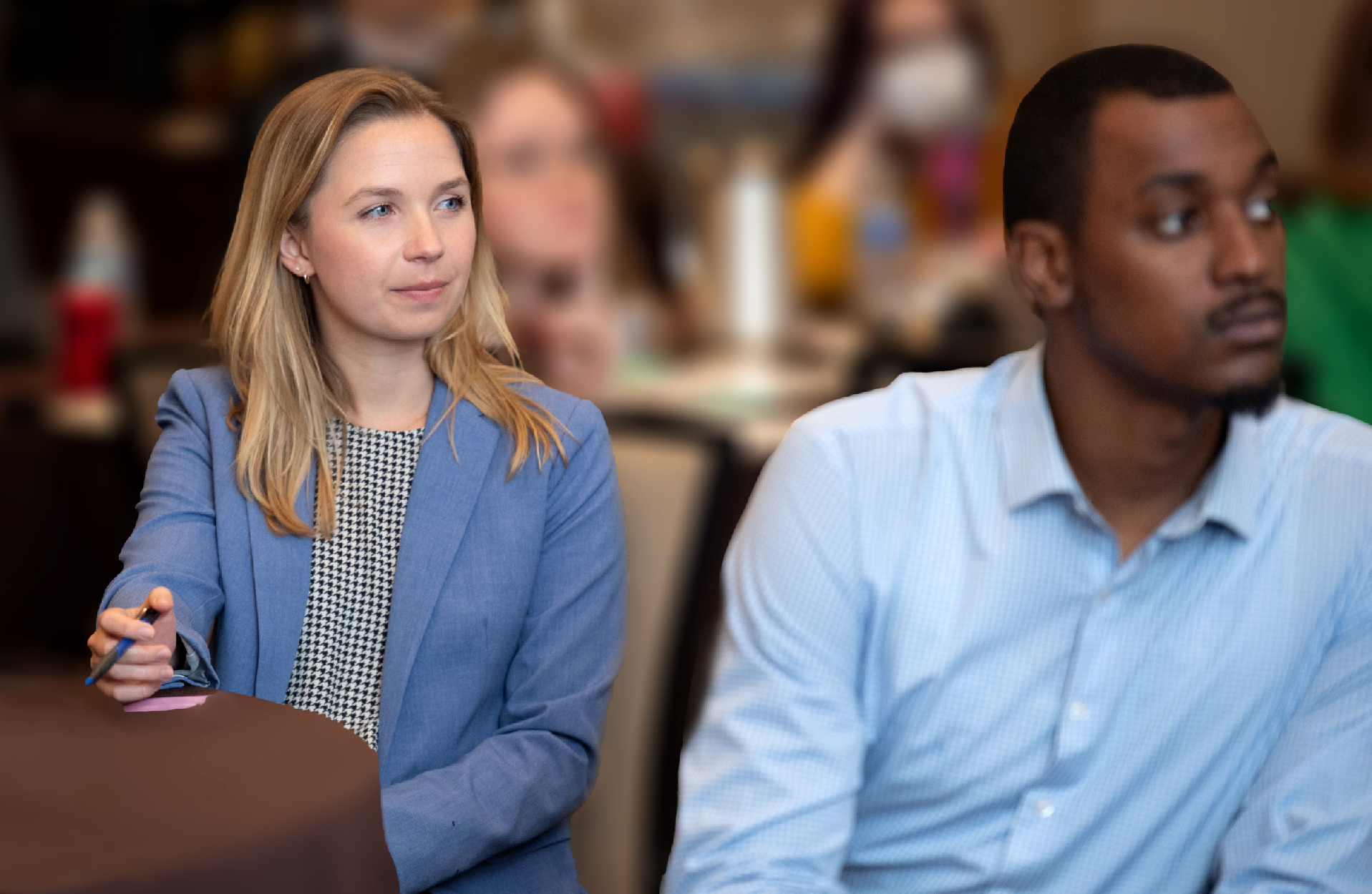 two business people looking in the distance